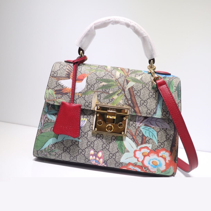 G*u*i top handle bags